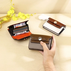 Short PU leather accordion card wallet with contrast colors and round metal buckle