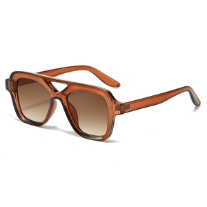 Brown translucent square double-bridge sunglasses with amber frames and gradient lenses