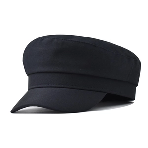 Side view of black cotton twill flat top navy cap showing structured brim and solid finish