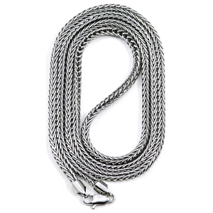 Macro detail of high-quality silver foxtail chain necklace with a lobster clasp