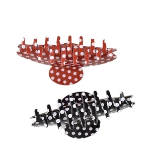 Polka dot PVC hair claws in red and black colors for sweet ponytail hairstyles