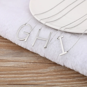 Minimalist silver stainless steel initial necklaces with G, H, I alphabet pendants