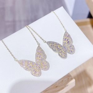 Elegant gold butterfly pendant necklace with purple zircon and pave crystal stones