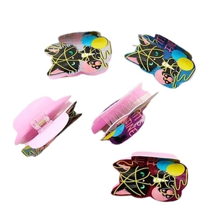Pink cat hair claws with glitter and 'IT'S FINE' text shown in multiple angles