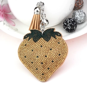 Glittering strawberry charm with tassels and crystals for handbags or keychains