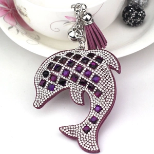 Sparkling purple dolphin keychain with square rhinestones, purple tassel and bell