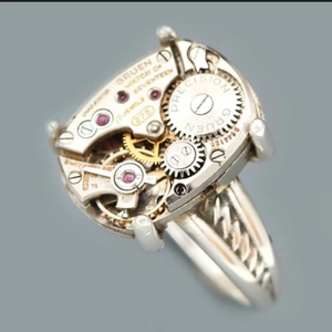 Macro detail of retro steampunk mechanical watch movement ring with 17 jewels