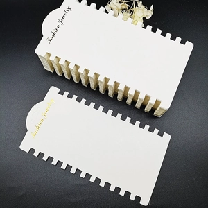 White 12-slot jewelry display cards for bracelets and hair ties with gold Fashion Jewelry text
