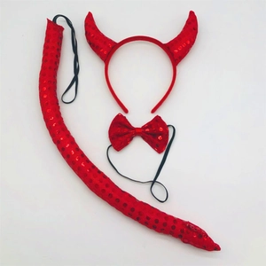 Detail of red sequin devil horn headband, bowtie, and tail set for Halloween costumes