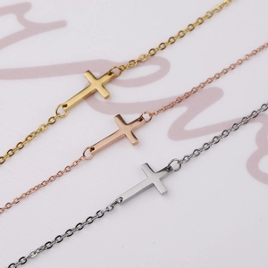 Sleek mirror-finish stainless steel cross bracelets in gold, rose gold and silver