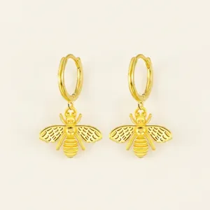Detail view of 925 sterling silver bee charm hoop earrings with 9mm inner diameter
