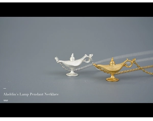 Detailed view of creative Aladdin's lamp pendant necklaces in gold and silver finishes