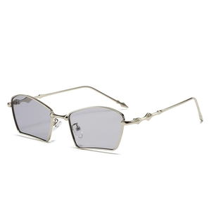 Modern geometric pentagon metal sunglasses with light gold frames and grey lenses