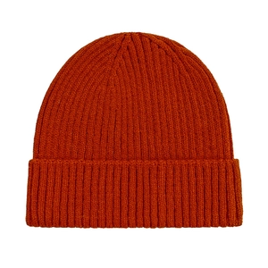 Detailed close-up of bright orange ribbed knit beanie showing high-quality wool texture
