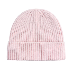 Close-up of pink knit beanie showing ribbed texture and elastic warm fabric detail