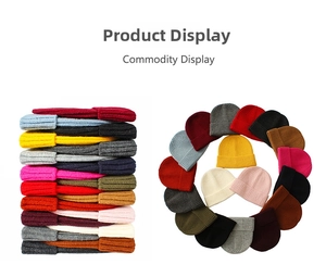 Detail showing various colors of knitted beanies stacked and arranged in a circle