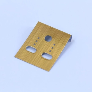 Detailed macro view of golden plastic jewelry cards with Fashion Jewelry print and hanging holes