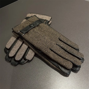 Men's winter gloves featuring brown herringbone wool and black leather with wrist strap