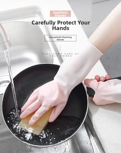 Pink waterproof latex gloves cleaning kitchen dishes under running water