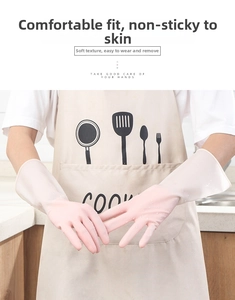 Close-up of pink gradient waterproof latex cleaning gloves for household and kitchen tasks