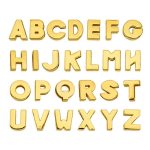 Macro view of 26 pieces gold letter pendants set in grid layout for DIY jewelry