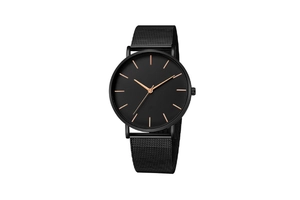 Detailed close-up of minimalist black mesh strap quartz watch with rose gold indices