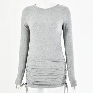 Close-up of grey long sleeve ribbed dress with adjustable drawstring details on the hem