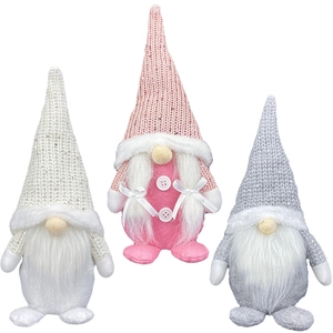 Three Nordic Christmas gnomes in white, pink and grey with sequin hats and faux fur beards