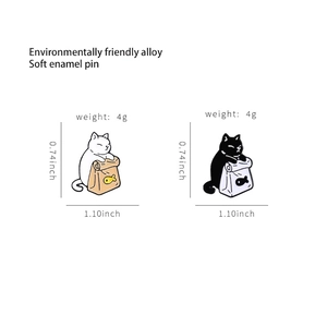 Cute black and white enamel cat pins with fish bag design made of eco-friendly alloy