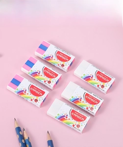 Close-up of pastel rainbow and white erasers with colorful paper sleeves for students