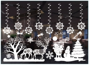White Christmas window decals featuring reindeer, snowflakes and Santa for glass decor
