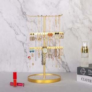 Multi-tier gold metal jewelry organizer with round base for necklaces and earrings