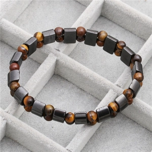 Men's beaded bracelet featuring tiger eye stones and dark grey metallic rectangular beads