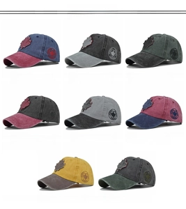 Grid view of vintage washed cotton baseball caps with Canadian maple leaf embroidery