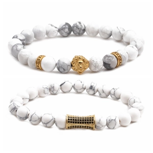 Mens beaded lion head bracelets with white marble stone and gold accents on white background