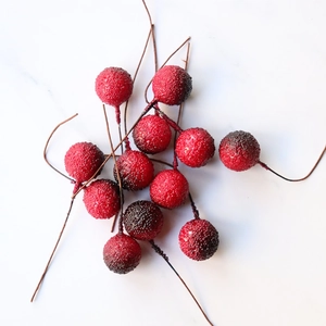 Realistic 16mm red crystal artificial berry decor on elegant white marble surface