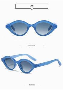 Vue détaillée des lunettes de soleil ovales bleu roi avec verres dégradés gris et charnière