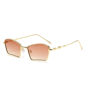 Fashionable geometric gold metal sunglasses with brown gradient lenses for street style