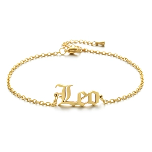 Detail shot of the golden Leo zodiac pendant on a stainless steel adjustable chain