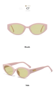 Détails de lunettes de soleil œil de chat roses avec verres jaunes et accents dorés