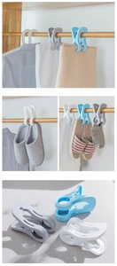 Macro detail of large plastic windproof clothes pegs with non-slip teeth for drying quilts