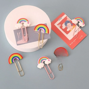 Close-up of colorful rainbow and cloud PVC soft glue decorative metal paperclips set