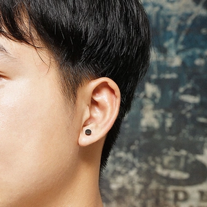 Minimalist matte black round barbell stud earring for men in a trendy geometric style