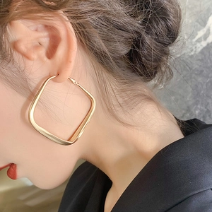 Exaggerated matte gold square geometric hoop earrings with a brushed metal finish for women