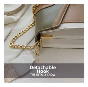Detail showing the detachable golden hook and tricolor patchwork on the crossbody bag