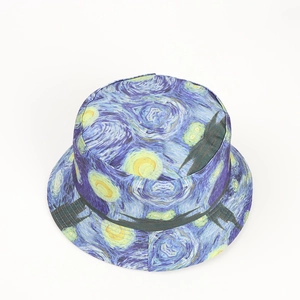 Detailed view of The Starry Night painting print on a reversible canvas bucket hat