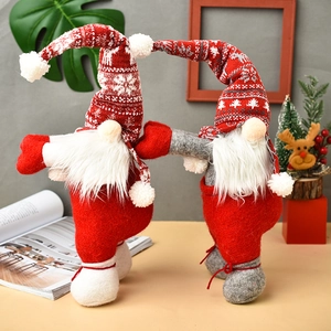 Pair of festive Christmas gnome curtain tiebacks with red snowflake hats and white beards