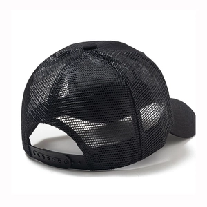 Detail of adjustable black plastic strap and breathable mesh on the baseball cap