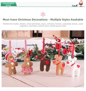 Close-up of felt gingerbread and reindeer Christmas ornaments with hand-stitched details
