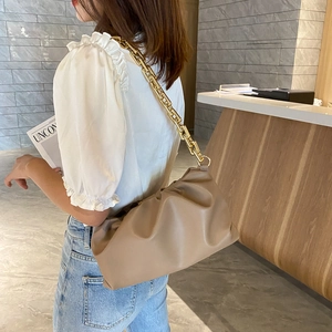 Khaki cloud shoulder bag detail featuring soft PU leather pleats and gold chain strap